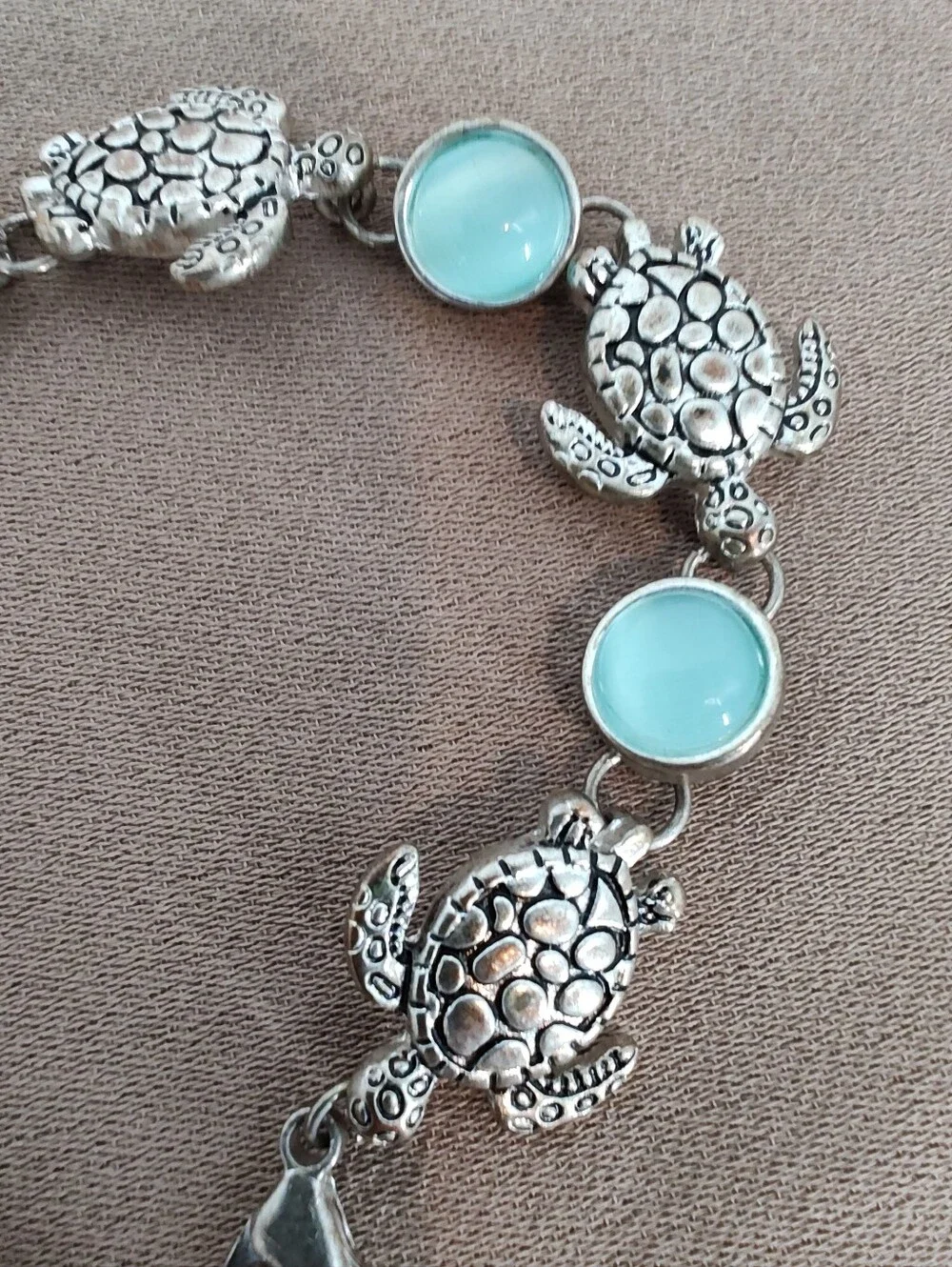 Silver Tone Turtle Link Bracelet with Light Blue Cabochons